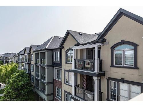 401-3070 Rotary Way, Burlington, ON - Outdoor With Balcony