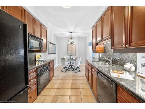 503-65 Port Street E, Mississauga, ON - Indoor Photo Showing Kitchen With Double Sink