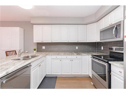 8A Hainer Street, St. Catharines, ON - Indoor Photo Showing Kitchen With Double Sink