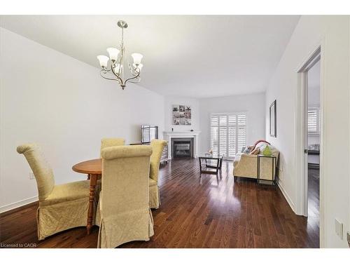 10 Cornflower Crescent, Hamilton, ON - Indoor Photo Showing Dining Room With Fireplace