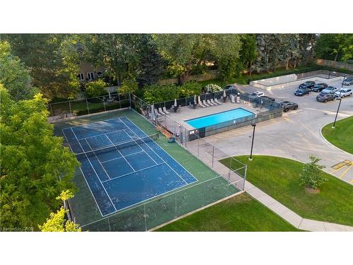 302-1201 North Shore Boulevard E, Burlington, ON - Outdoor With In Ground Pool With Backyard