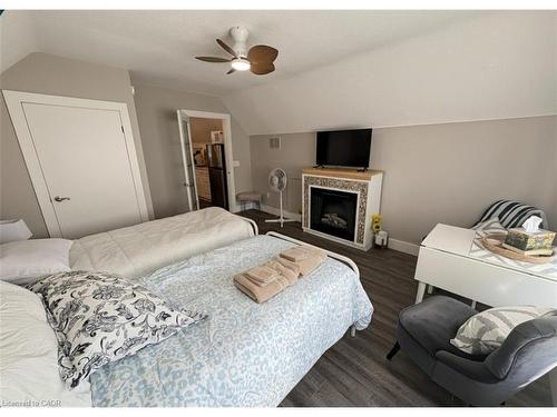 691 Wilson Street, Hamilton, ON - Indoor Photo Showing Bedroom With Fireplace