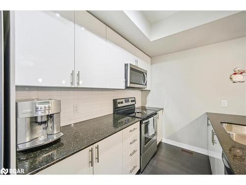 107-1202 Main Street E, Milton, ON - Indoor Photo Showing Kitchen With Double Sink With Upgraded Kitchen
