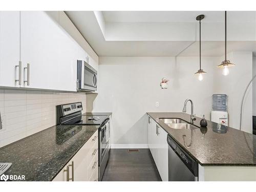 107-1202 Main Street E, Milton, ON - Indoor Photo Showing Kitchen With Double Sink With Upgraded Kitchen
