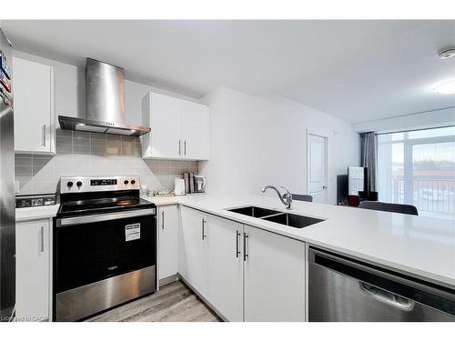 217-1 Redfern Avenue, Hamilton, ON - Indoor Photo Showing Kitchen With Stainless Steel Kitchen With Double Sink