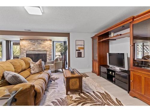 20 Grandy Lane, Cambridge, ON - Indoor Photo Showing Living Room With Fireplace