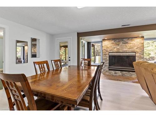 20 Grandy Lane, Cambridge, ON - Indoor Photo Showing Dining Room With Fireplace