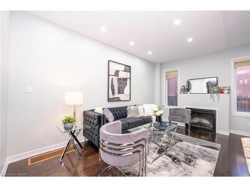 17 Primo Road, Brampton, ON - Indoor Photo Showing Living Room With Fireplace