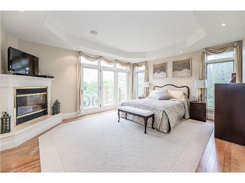 338 River Oak Place, Waterloo, ON - Indoor Photo Showing Bedroom With Fireplace