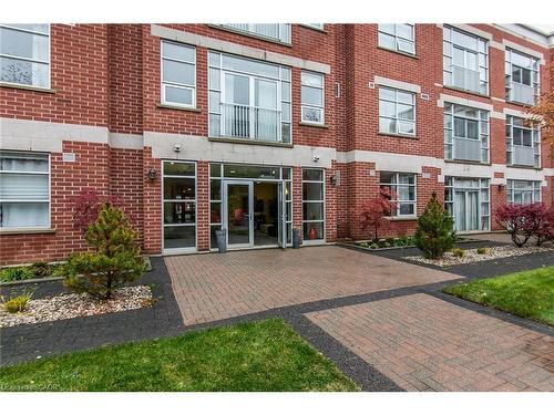 211-165 Duke Street E, Kitchener, ON - Outdoor With Facade