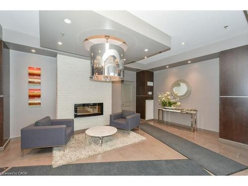 307-191 King Street S, Waterloo, ON - Indoor With Fireplace
