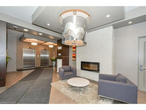 307-191 King Street S, Waterloo, ON - Indoor With Fireplace