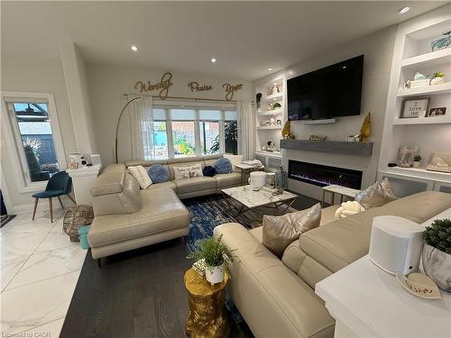 11 Donatello Court, Hamilton, ON - Indoor Photo Showing Living Room With Fireplace