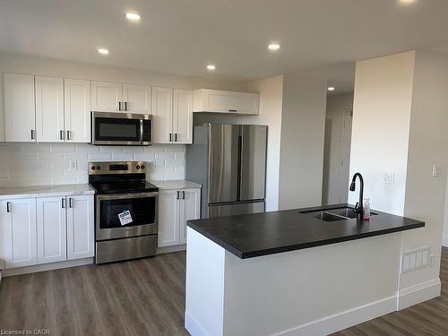 329 Upper Sherman Avenue, Hamilton, ON - Indoor Photo Showing Kitchen With Double Sink