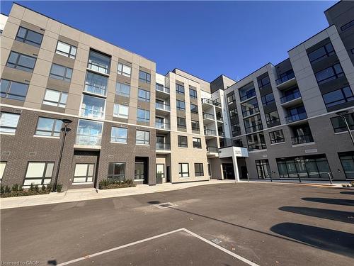 220-3250 Carding Mill Trail, Oakville, ON - Outdoor With Facade