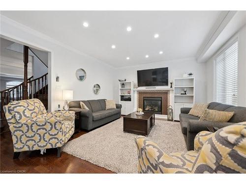 305 Pine Valley Drive, Kitchener, ON - Indoor Photo Showing Living Room With Fireplace