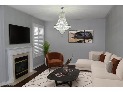 2128 Blackforest Crescent, Oakville, ON - Indoor Photo Showing Living Room With Fireplace