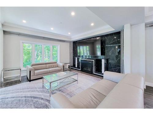 5-1261 Mohawk Road W, Ancaster, ON - Indoor Photo Showing Living Room With Fireplace