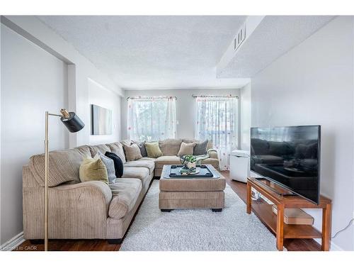 101-4872 Valley Way, Niagara Falls, ON - Indoor Photo Showing Living Room