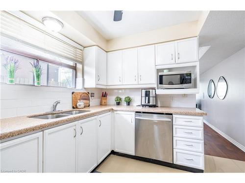 101-4872 Valley Way, Niagara Falls, ON - Indoor Photo Showing Kitchen With Double Sink