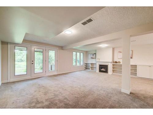 670 Salzburg Drive, Waterloo, ON - Indoor Photo Showing Other Room With Fireplace