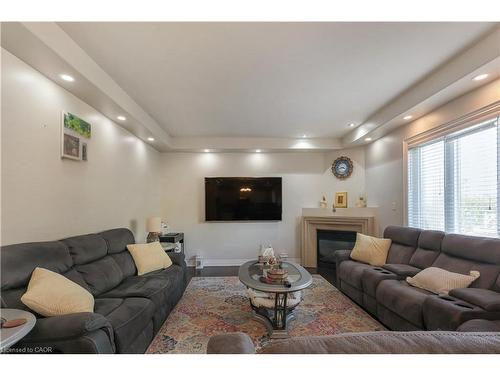 254 Rymal Road W, Hamilton, ON - Indoor Photo Showing Living Room With Fireplace