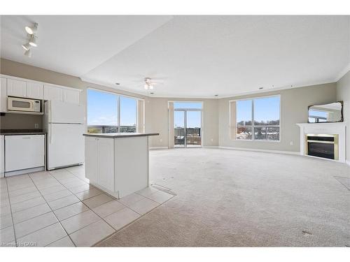 706-255 Keats Way, Waterloo, ON - Indoor Photo Showing Other Room With Fireplace