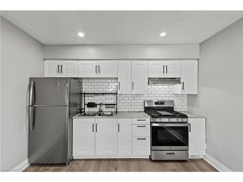 15 Mccormick Street, Welland, ON - Indoor Photo Showing Kitchen With Double Sink
