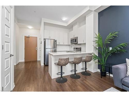 627-1105 Leger Way, Milton, ON - Indoor Photo Showing Kitchen With Upgraded Kitchen