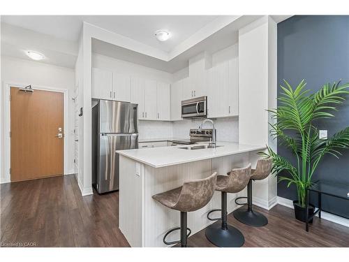 627-1105 Leger Way, Milton, ON - Indoor Photo Showing Kitchen With Double Sink