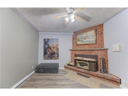 320 Country Hill Drive, Kitchener, ON - Indoor Photo Showing Living Room With Fireplace