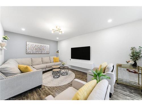 23 Stonegate Drive, Kitchener, ON - Indoor Photo Showing Living Room With Fireplace