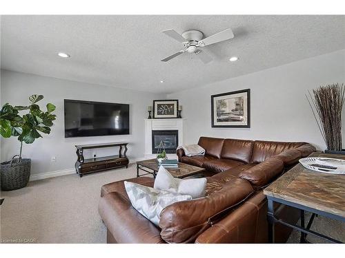 8 Zaduk Place, Guelph, ON - Indoor Photo Showing Living Room With Fireplace
