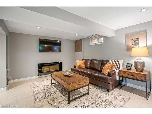 4 Upper Canada Drive, St. Catharines, ON - Indoor Photo Showing Living Room With Fireplace