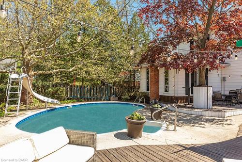 65 Banff Street, Caledonia, ON - Outdoor With Above Ground Pool