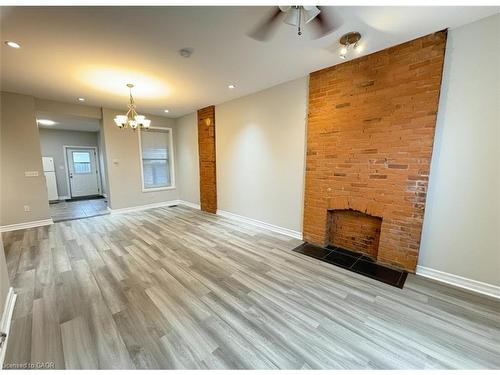 126 Park Street N, Hamilton, ON - Indoor Photo Showing Other Room With Fireplace