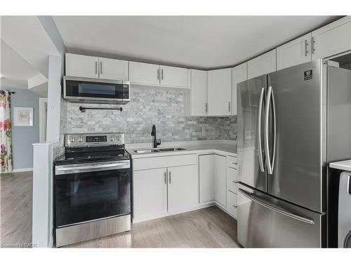 9 Hope Avenue, Hamilton, ON - Indoor Photo Showing Kitchen With Double Sink