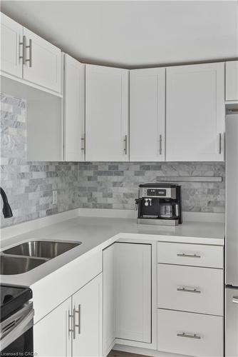 9 Hope Avenue, Hamilton, ON - Indoor Photo Showing Kitchen With Double Sink