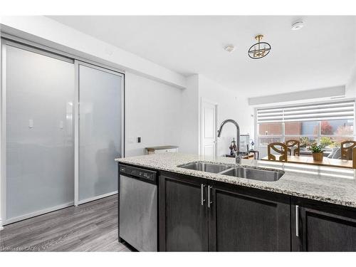226-1050 Main Street E, Milton, ON - Indoor Photo Showing Kitchen With Double Sink
