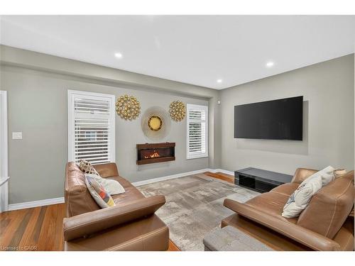 6-6 Atessa Drive, Hamilton, ON - Indoor Photo Showing Living Room With Fireplace