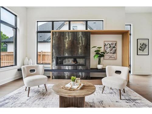 1613 G Lookout Street, Fonthill, ON - Indoor Photo Showing Living Room With Fireplace