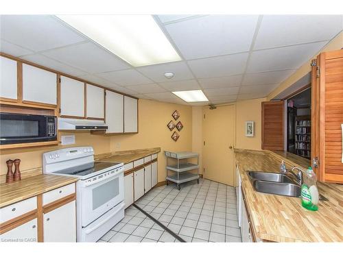 702-6 Willow Street, Waterloo, ON - Indoor Photo Showing Kitchen With Double Sink