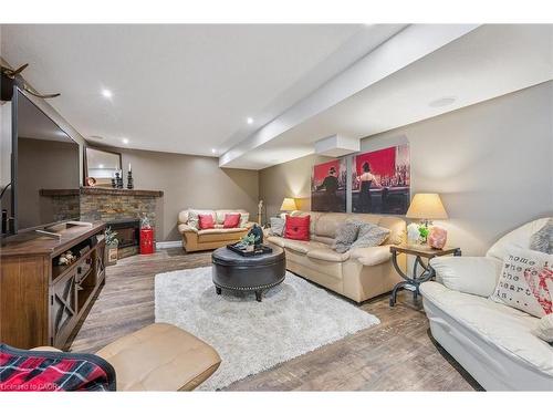 7 Hearthbridge Street, Kitchener, ON - Indoor Photo Showing Living Room With Fireplace