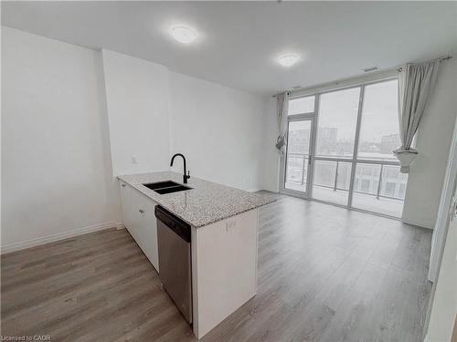 409-60 Charles Street W, Kitchener, ON - Indoor Photo Showing Kitchen With Double Sink