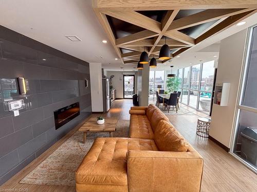 409-60 Charles Street W, Kitchener, ON - Indoor With Fireplace