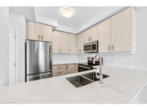 100-30 Times Square Boulevard, Stoney Creek, ON - Indoor Photo Showing Kitchen With Stainless Steel Kitchen With Double Sink With Upgraded Kitchen