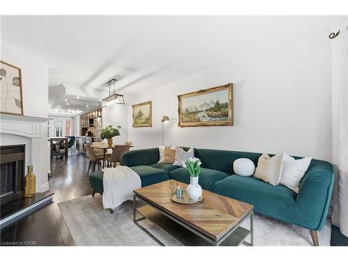 614-895 Maple Avenue, Burlington, ON - Indoor Photo Showing Living Room With Fireplace