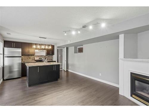 360 Culpepper Place, Waterloo, ON - Indoor Photo Showing Kitchen With Fireplace