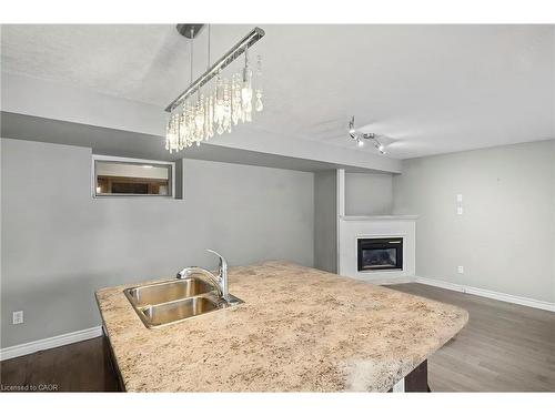 360 Culpepper Place, Waterloo, ON - Indoor Photo Showing Other Room With Fireplace