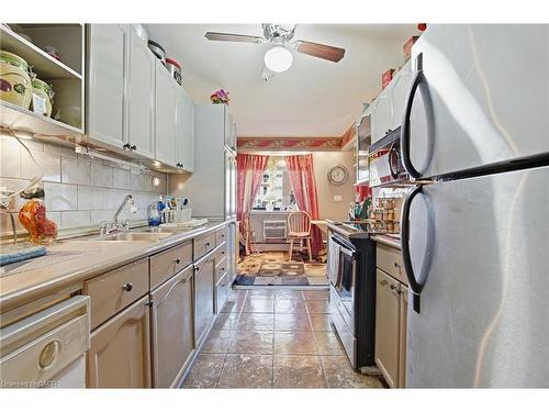 103-510 Queenston Road, Hamilton, ON - Indoor Photo Showing Kitchen With Double Sink
